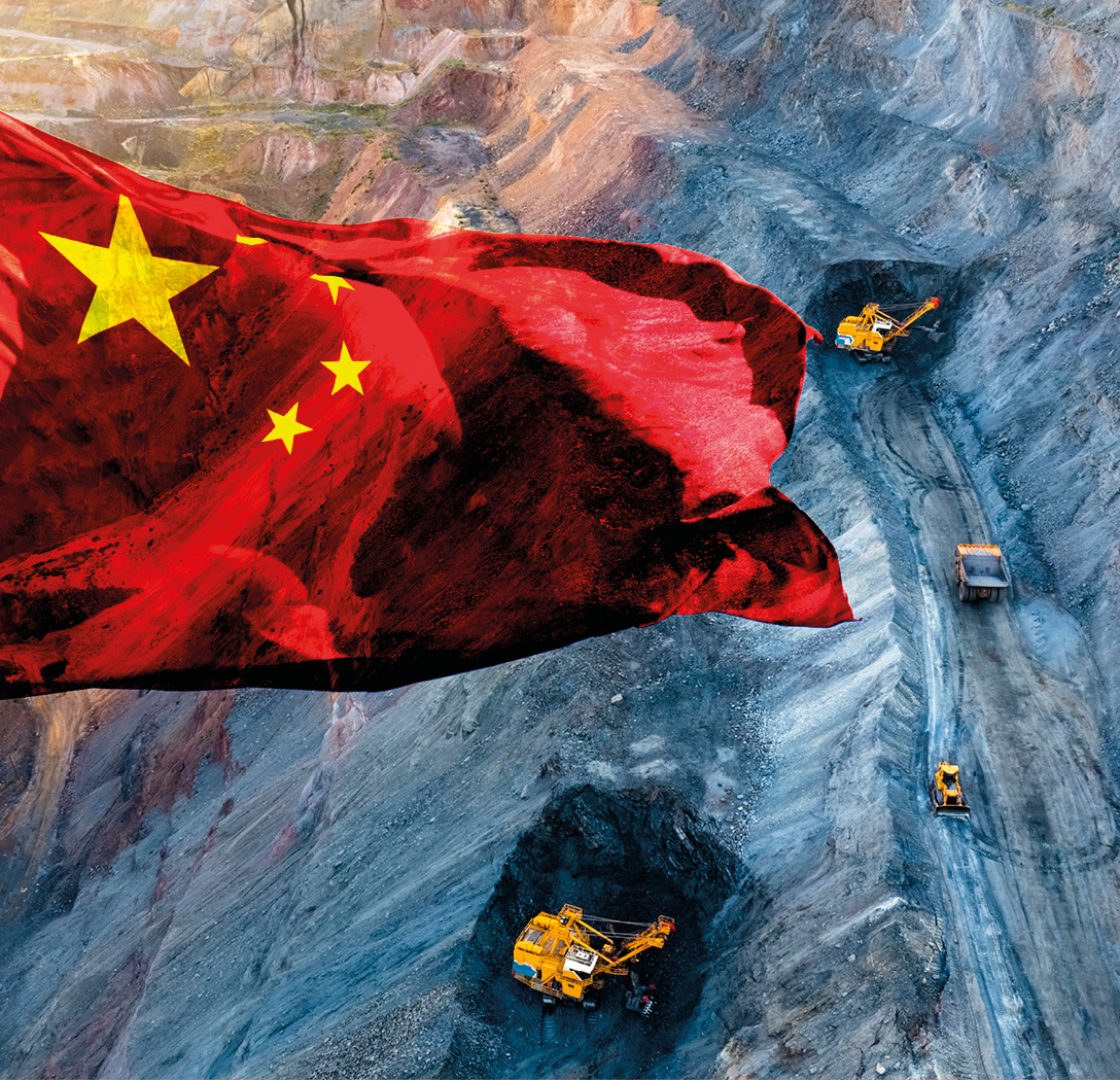Chinese flag floating over open air mine