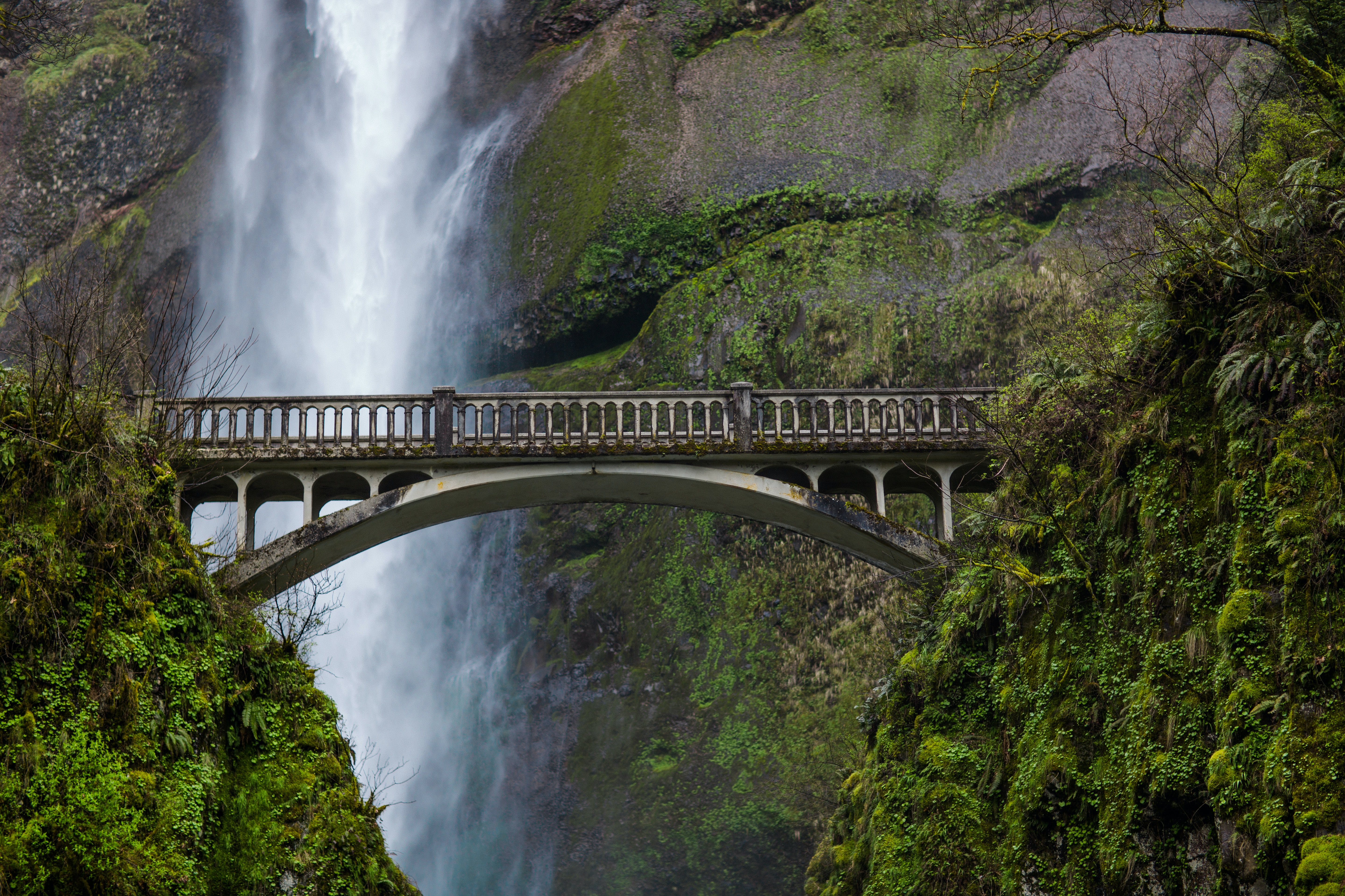 Bridge by waterfalls. Photo by James Forbes on Unsplash Bridge by waterfalls. Photo by James Forbes on Unsplash