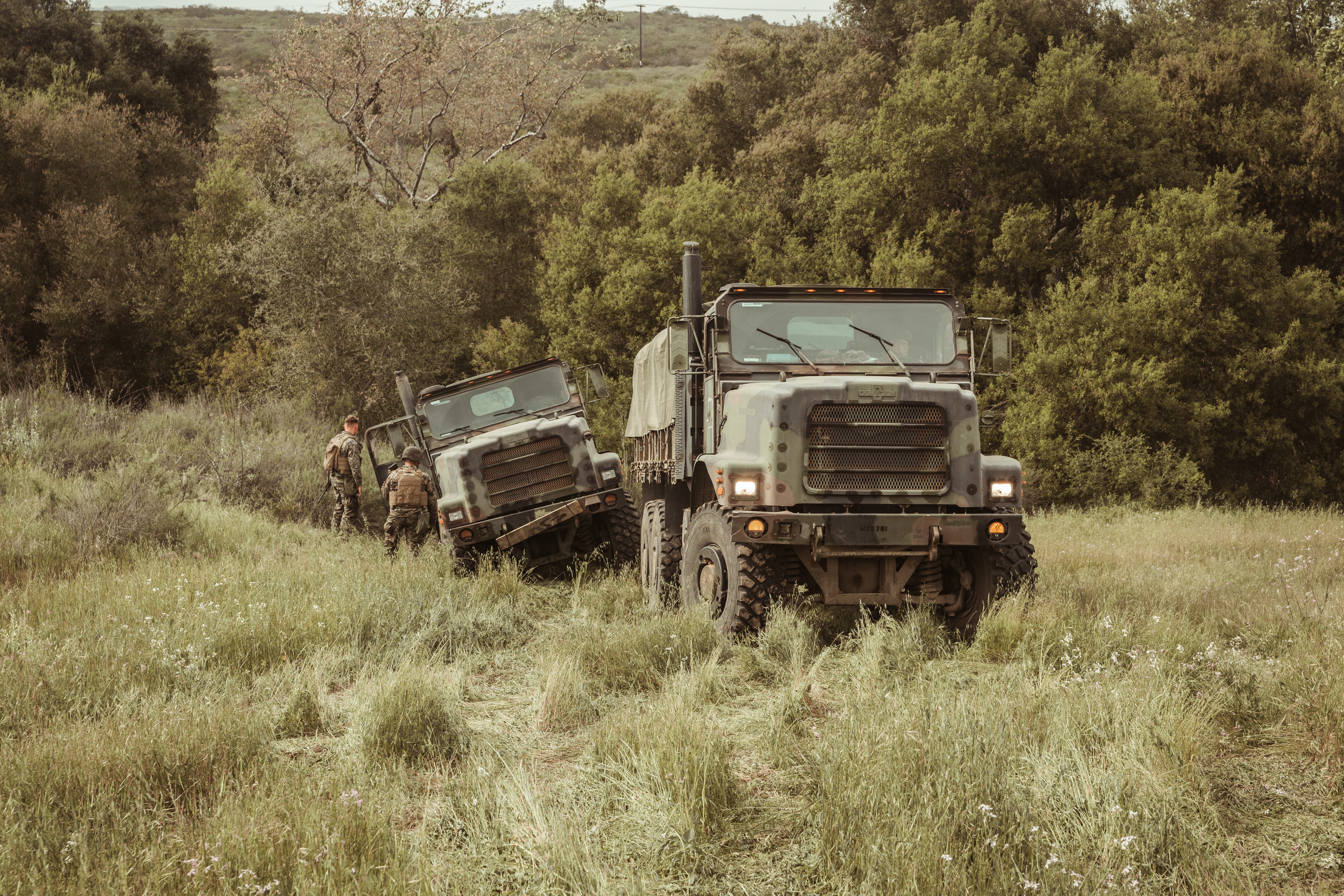 Image of military trucks - Photo by Joel Rivera-Camacho on Unsplash