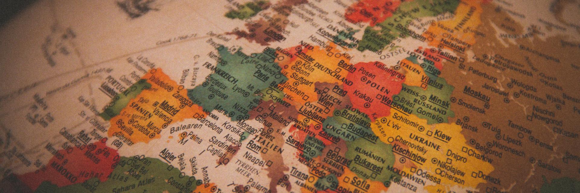  Vintage globe with Europe in focus | © Christian Lue, Unsplash