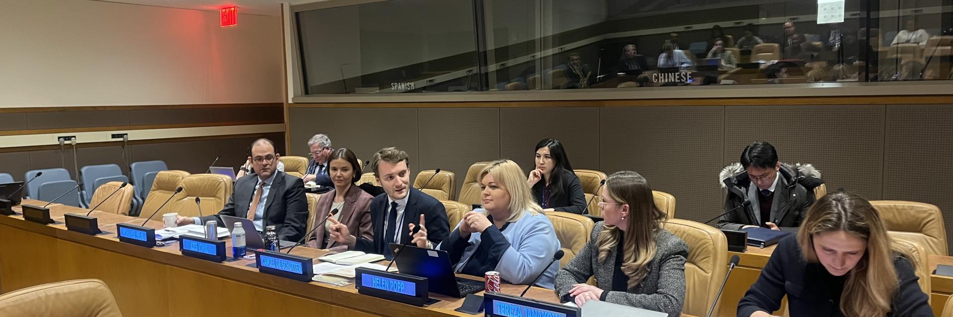 Participants sitting in meeting room. Photo credit: EUISS