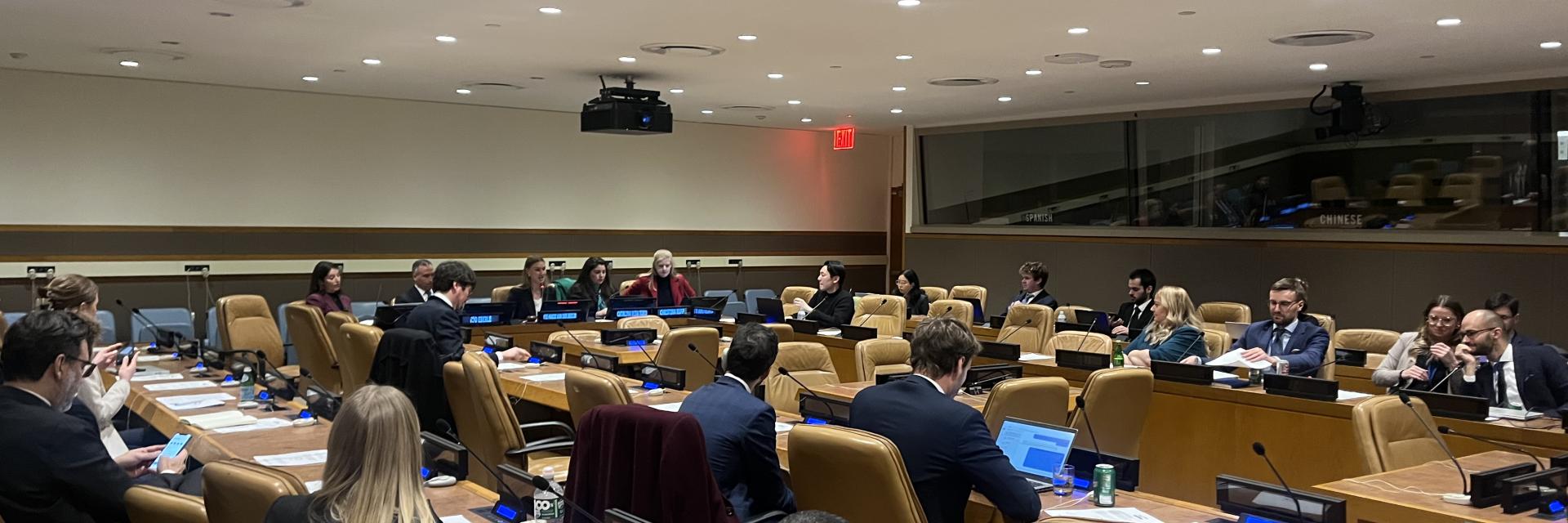 Participants sitting in meeting room. Photo credit: EUISS