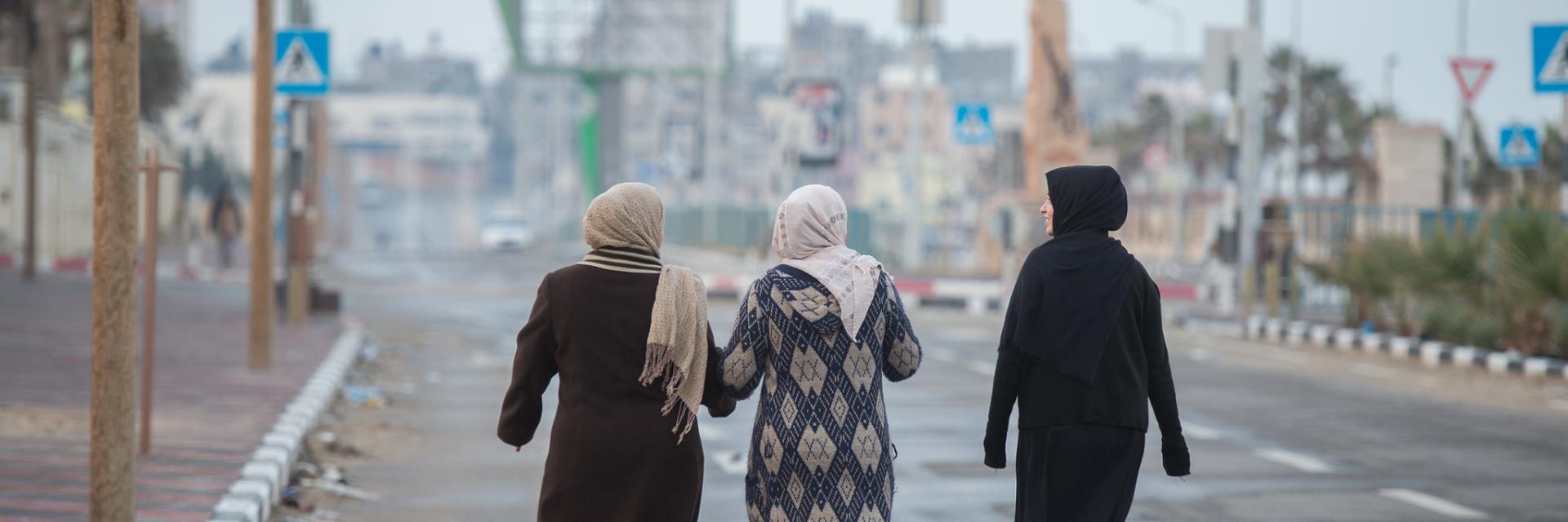 Palestinian women walking in a street. Credit photo: Catholic Church England and Wales, via Flickr