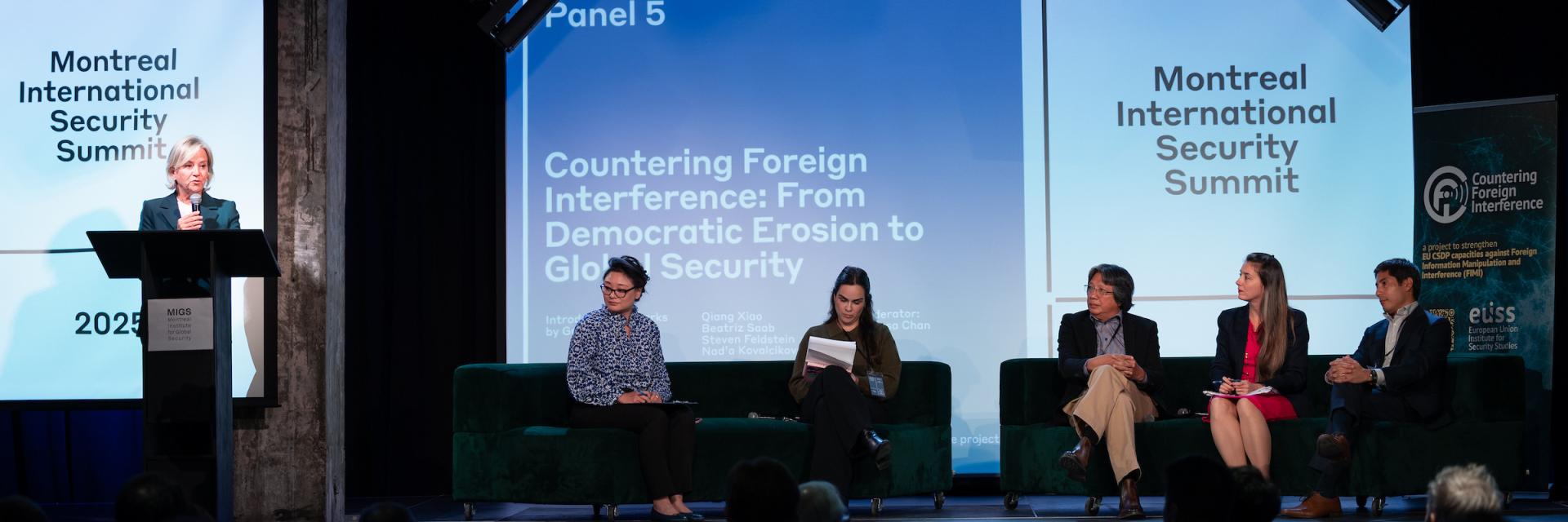 Speakers on stage at Montreal International Security Summit. Credit photo: JULIAN HABER-MIGS