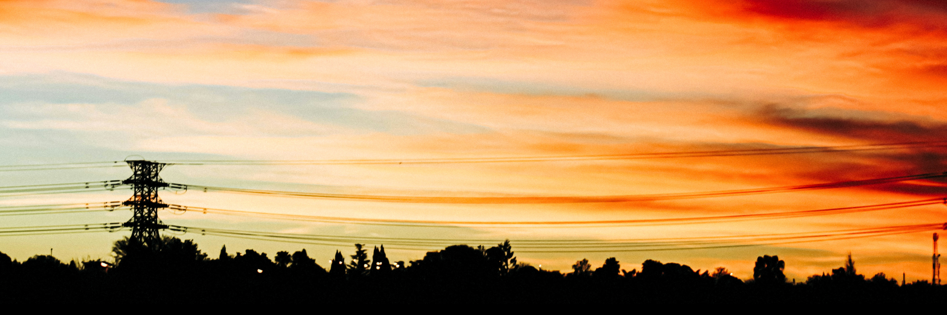 Sunset sky and power lines in South Africa | Credit: Roderick Laka on Unsplash 