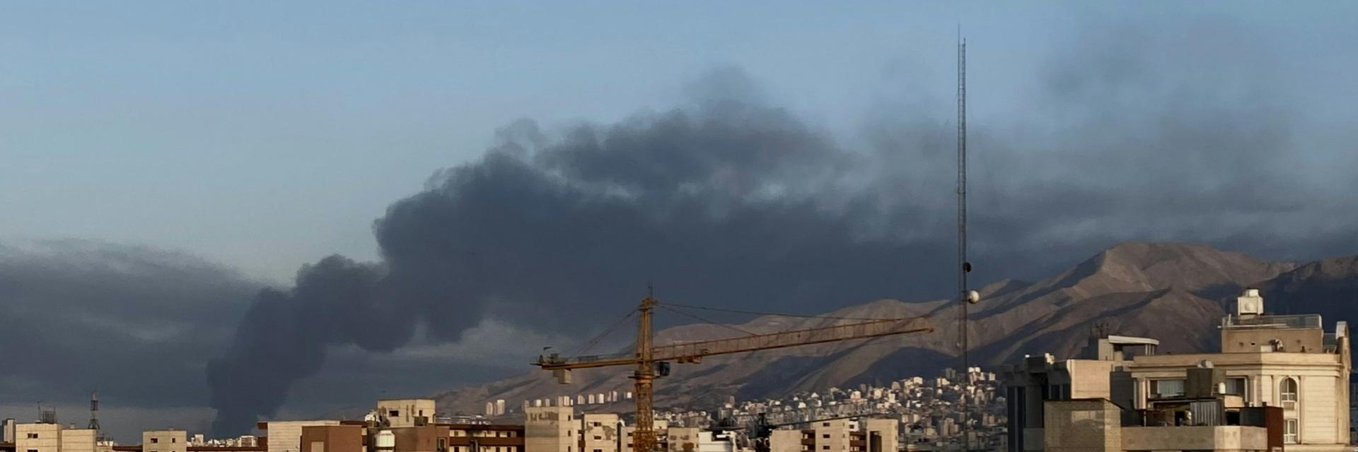 View of Teheran with smoke over buildings. Credit photo: Photo by sadaf vakilzadeh on Unsplash