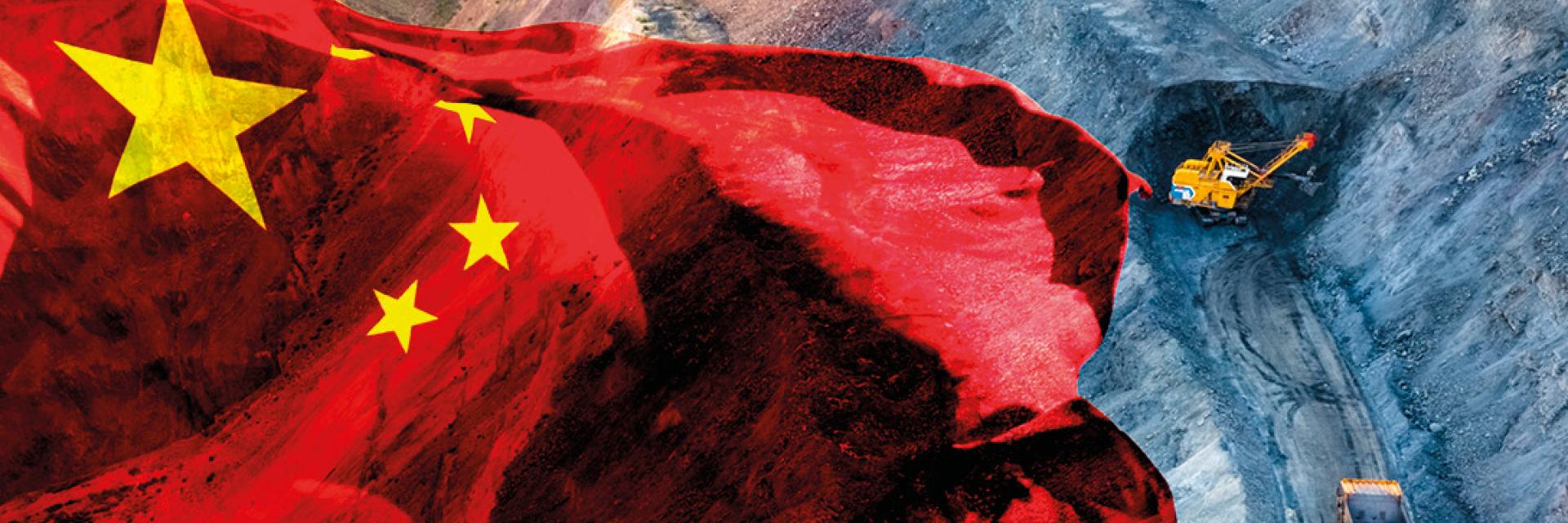 Chinese flag floating over open air mine