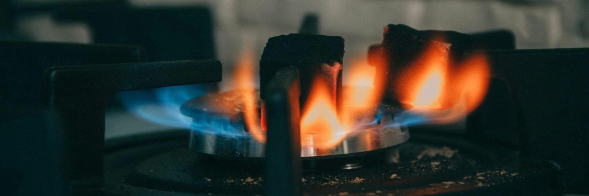 Close-up image of flame on a gas stove. Image credit to Alex Gagareen on Unsplash.