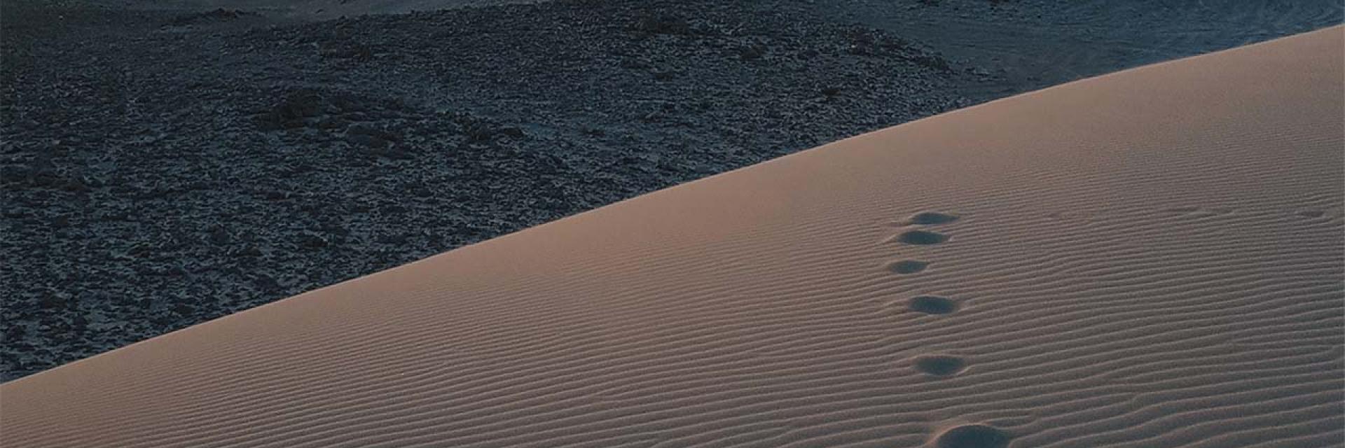 Image of footprints in the sand- © Unsplash