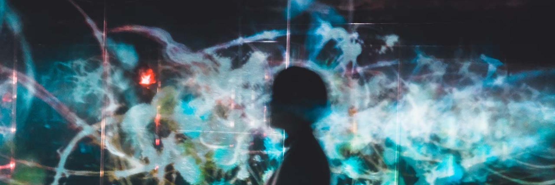 Abstract image of human figure with illuminations © Unsplash