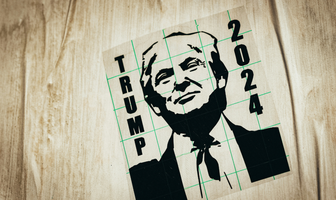 Campaign poster of Donald Trump, Photo by Jon Tyson for Unsplash
