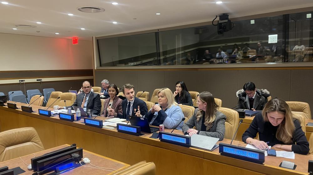 Participants sitting in meeting room. Photo credit: EUISS