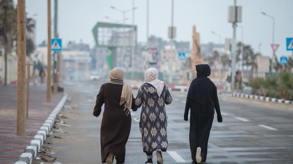 Palestinian women walking in a street. Credit photo: Catholic Church England and Wales, via Flickr