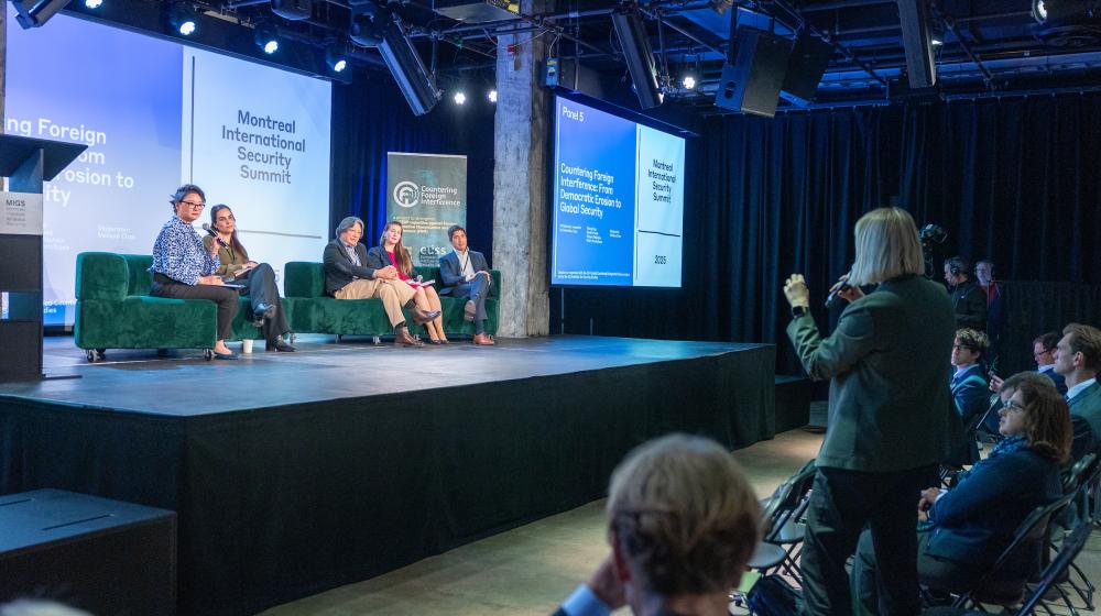 Speakers on stage at Montreal International Security Summit. Credit photo: JULIAN HABER-MIGS