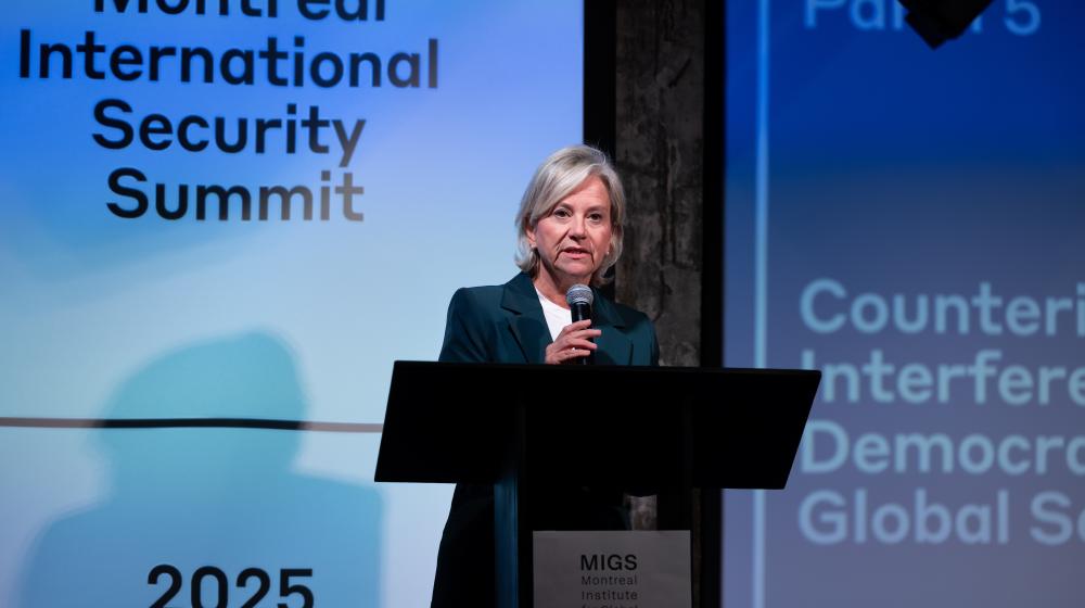 Speakers on stage at Montreal International Security Summit. Credit photo: JULIAN HABER-MIGS
