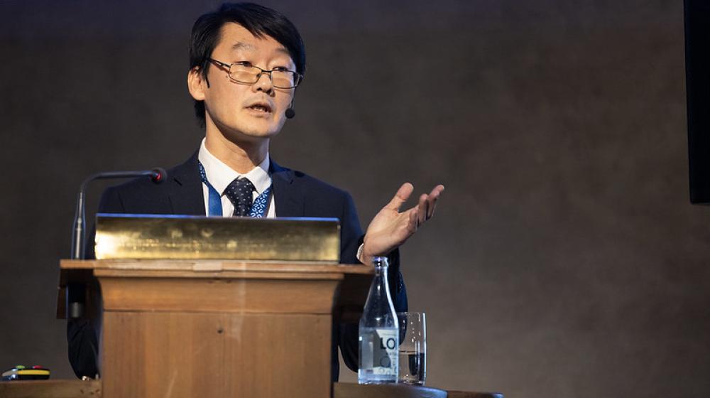 Jan Joel Andersson on stage presenting paper © Swedish Presidency of the Council of the EU Flicker 