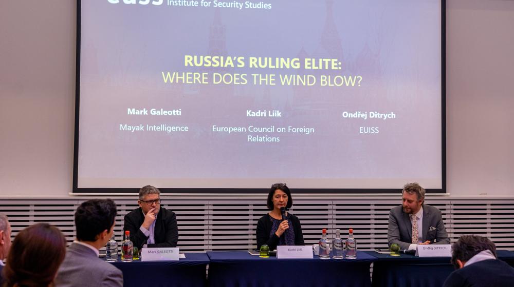 Image of individuals speaking on a panel © EUISS