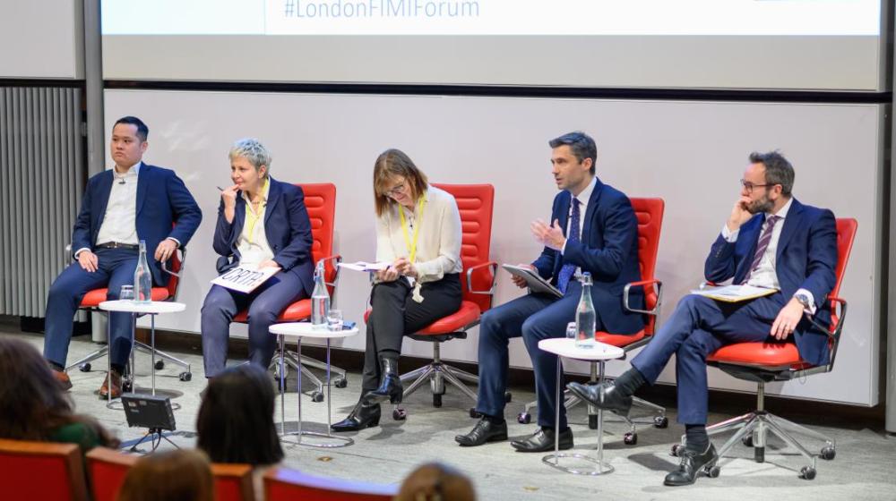 Image of a panel of speakers © EU delegation to the UK