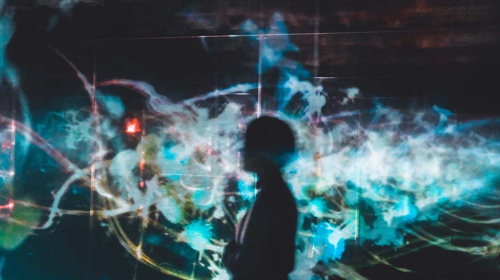 Abstract image of human figure with illuminations © Unsplash