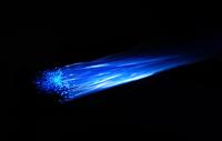 Blue light passing over fibre optic cable.