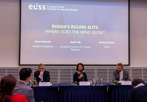 Image of individuals speaking on a panel © EUISS