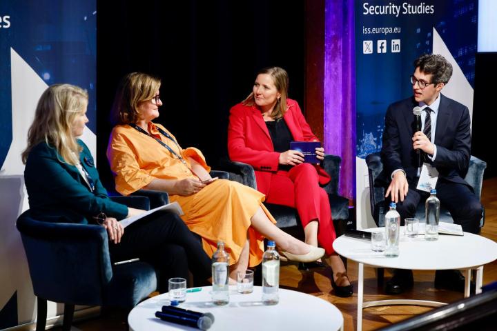 Panel speaking on stage at EUISS annual conference. Credit photo: EUISS