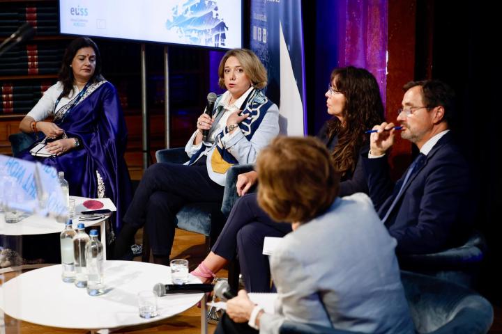 Panel speaking on stage at EUISS annual conference. Credit photo: EUISS